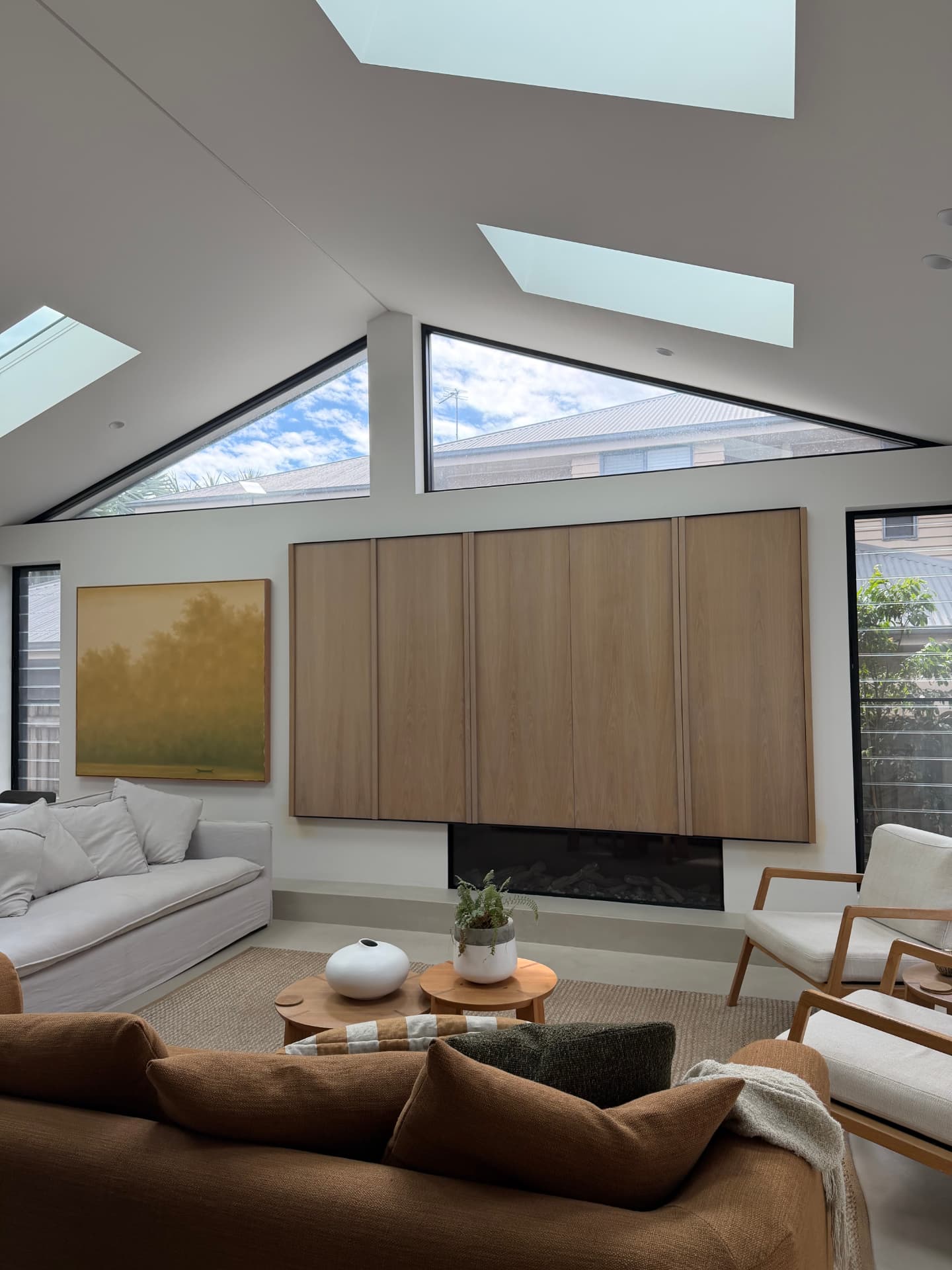 Andrew Place living room with raked ceiling, skylights and oak joinery